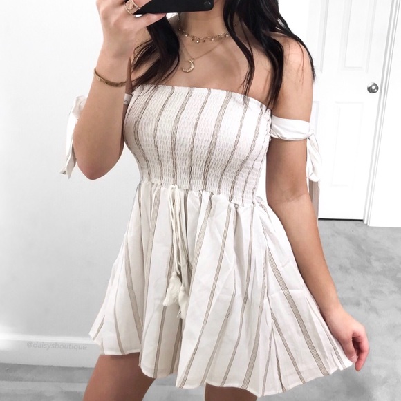 Daisys Boutique Dresses & Skirts - White striped smocked tie shoulder romper